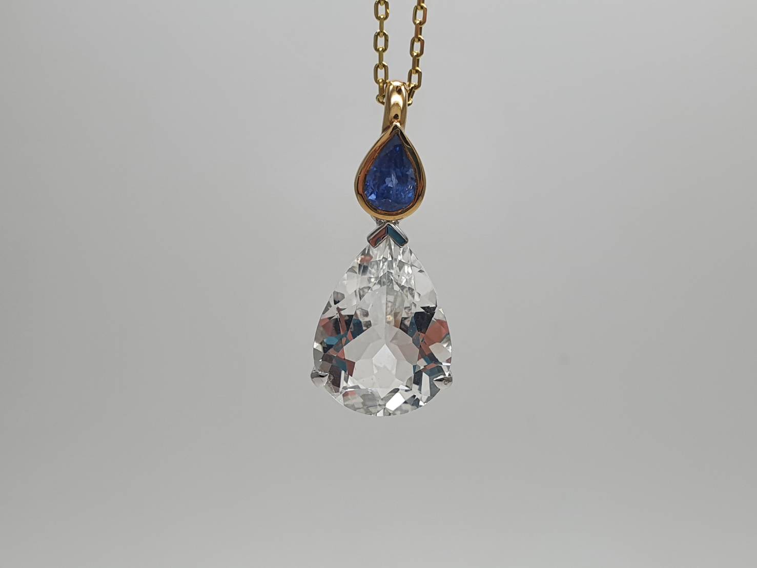 White Topaz with Blue Sapphire pendant